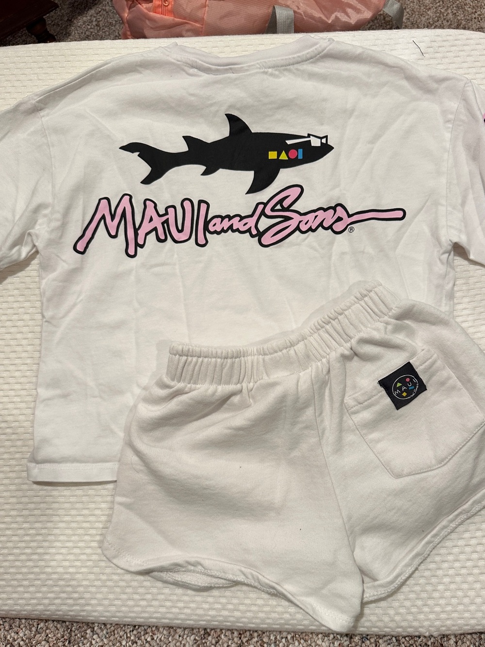 Zara t shirt size 9-10 and shorts size 11-12.  White with Maui logo design